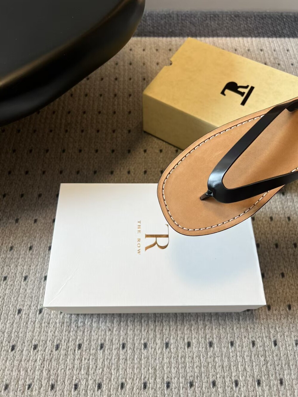 The Row Black Leather Thong Flip‑Flop Sandals